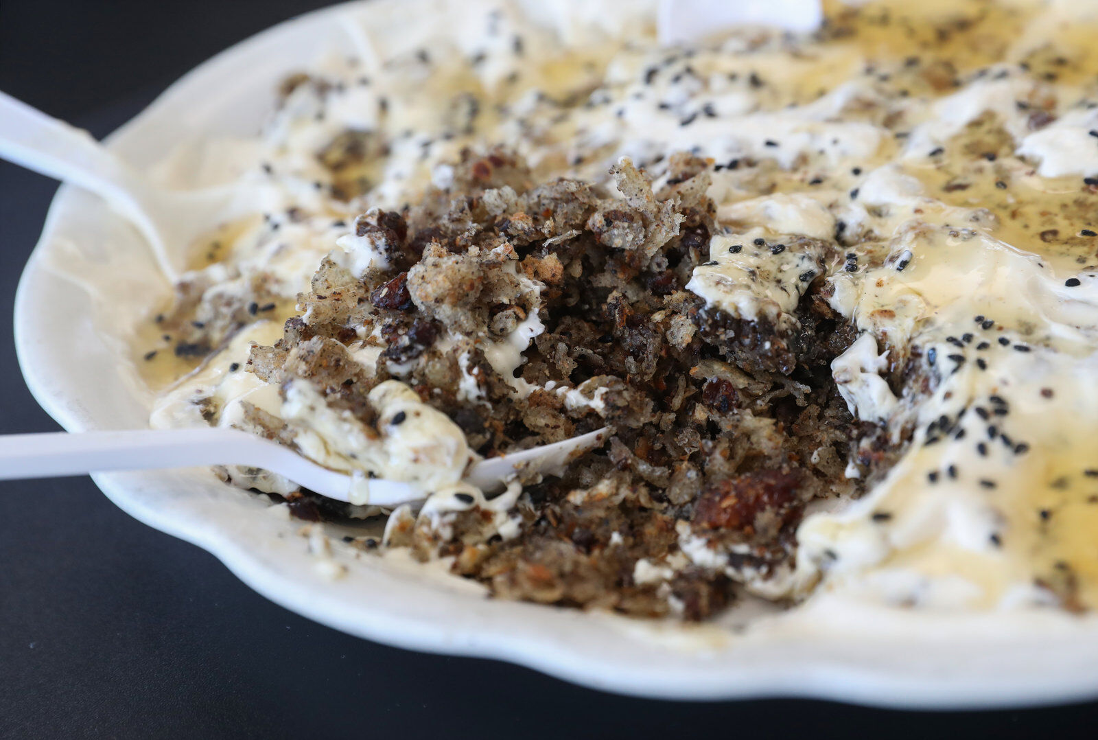 Fatah, Yemeni dessert of bread, butter, honey, dates, at Almandi restaurant